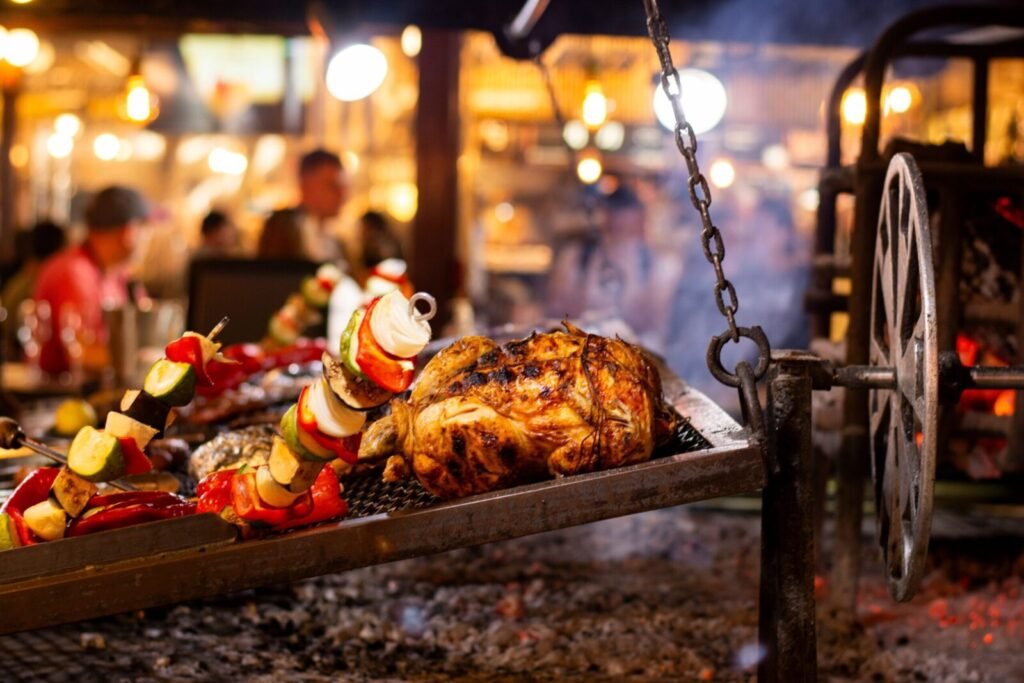 Sizzling roast meats and vibrant vegetables grilling over an open fire in a bustling market setup.